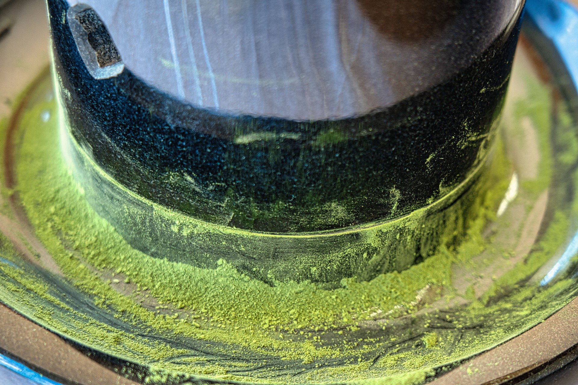 Matcha, the powdered form of the tea leaves, harvested and finely ground with millstone