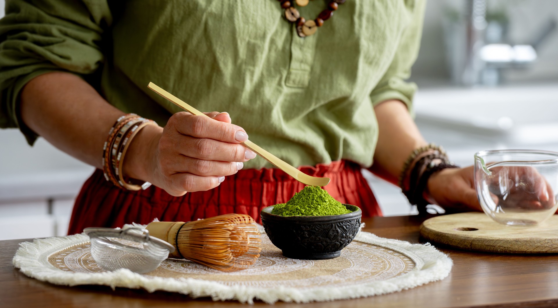 Woman Making Matcha Tea